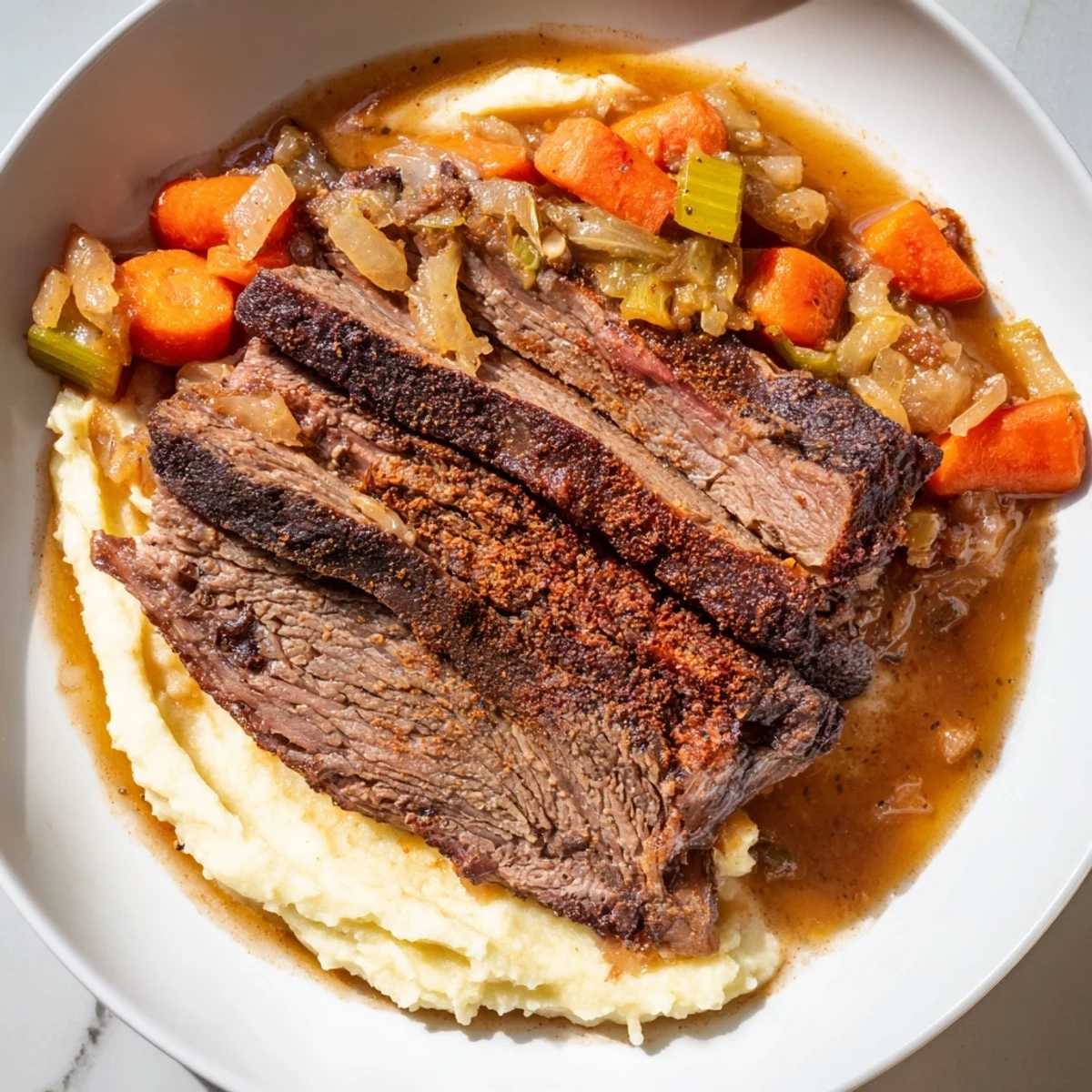 Slow-cooked classic brisket with sweet potatoes, a flavorful and hearty family meal pictured.