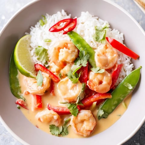 Vibrant Shrimp Coconut Curry Bowls: Fluffy jasmine rice brimming with tender shrimp and creamy curry.