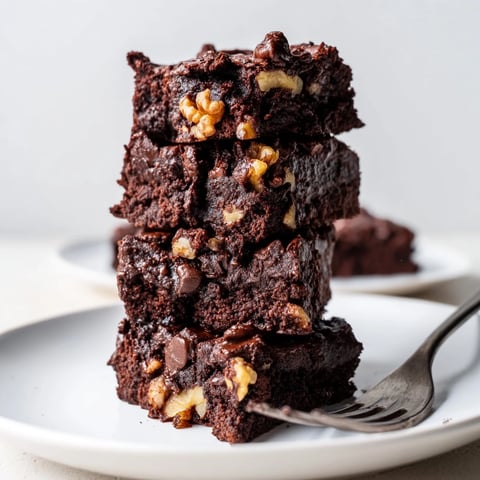 Rich, fudgy zero-waste brownies using nut-milk pulp, perfect for chocolate lovers.  