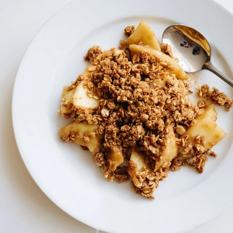 Golden-brown apple crisp with bubbly fruit, topped with a delicious, crunchy oat crumble.
