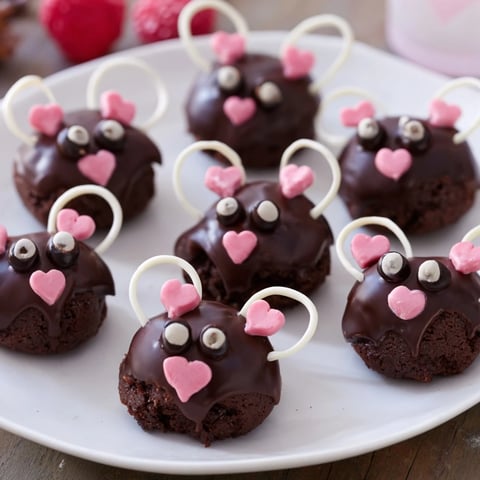 A tray of cute Silly Rat Cake Brownie Bites, offering a whimsical chocolate experience made from scratch.