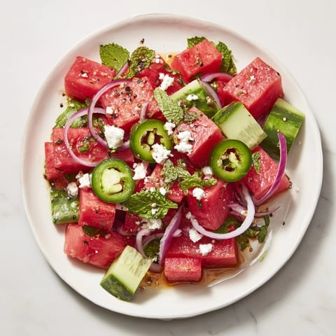 Vibrant Cucumber and Watermelon Hot Girl Salad with crumbled feta and zesty lime dressing.