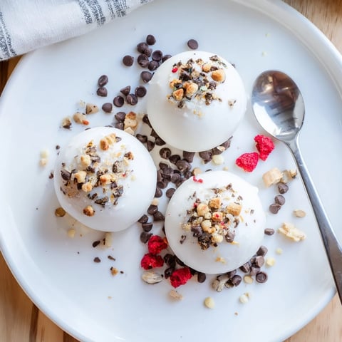 Rich, decadent Hot Cocoa Bomb Topping Bar ready for pouring hot milk and topping with treats.