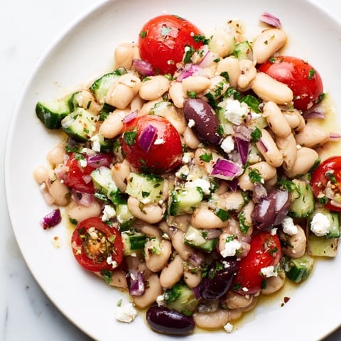 Bright and fresh white bean salad, bursting with cherry tomatoes and herbs, perfect for lunch.
