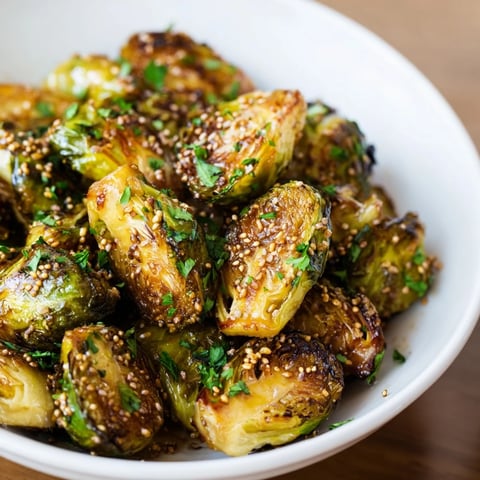 Golden and caramelized honey mustard glazed Brussels sprouts, a delicious, easy side dish recipe.