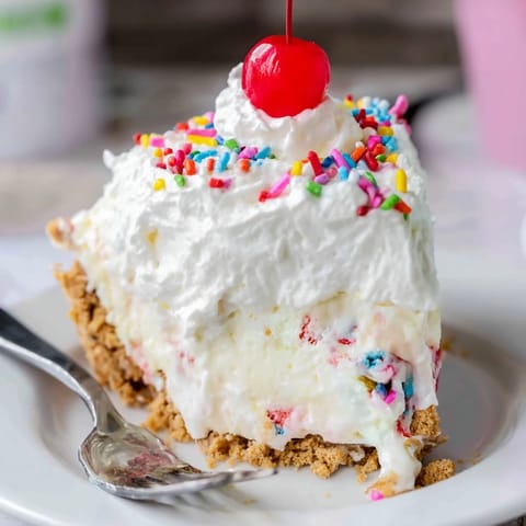 Vibrant Monster Energy Soda Float Pie showcases creamy layers and a crunchy graham crust.  