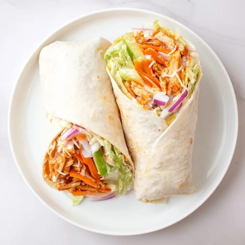 Spicy and crispy Air Fryer Buffalo Turkey Christmas Wraps, perfectly air-fried holiday leftovers, a great meal.