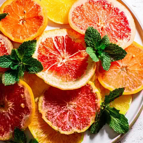 A colorful Fruit Board: Citrus Slice Garland Platter, arranged beautifully for a refreshing brunch treat.
